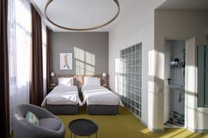 Отель Four Rooms City. Улучшенный двухместный с 2 кроватями и видом на город 1